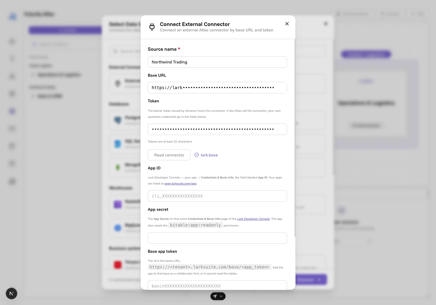 The External Connector form after Read connector: slug lark-base confirmed, with the App ID, App secret and Base app token inputs rendered below the token, each carrying its own placeholder and help line